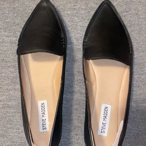 Black leather flats